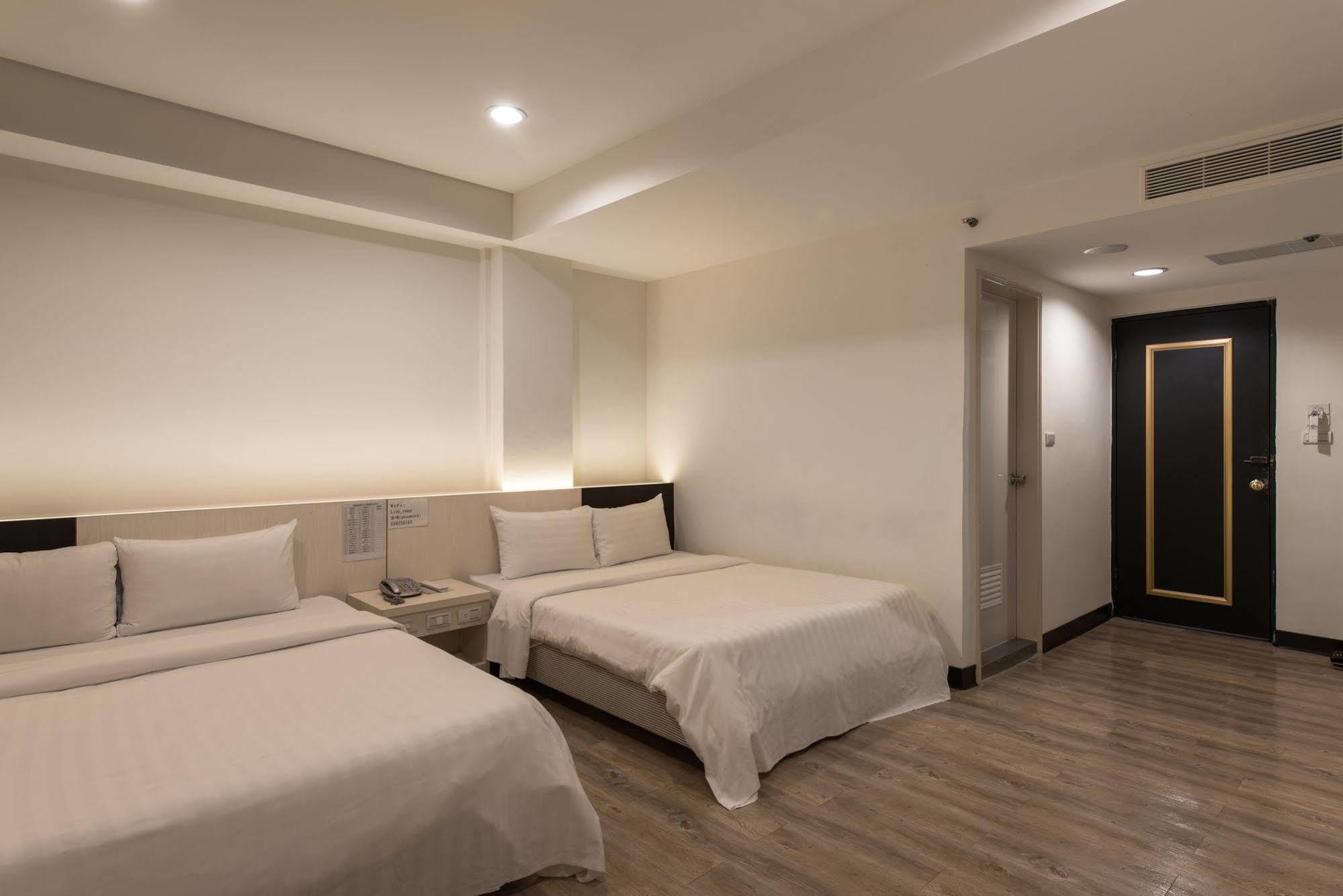 Lotus Yuan Business Hotel Чжунли Екстериор снимка